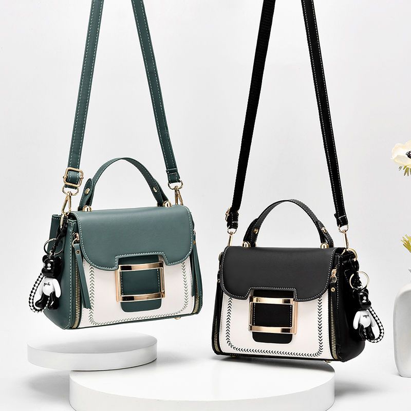 High-grade women's leather bag with bear keychain accessory