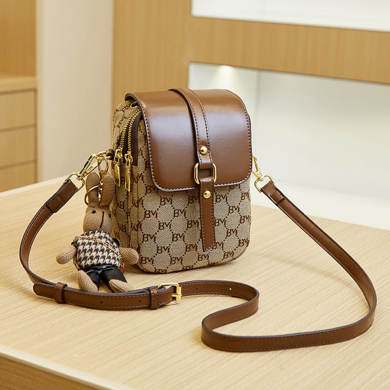 Mini bag with cute keychain crisscross pattern