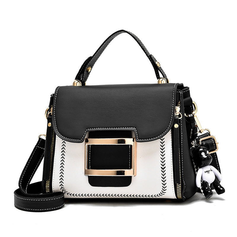 High-grade women's leather bag with bear keychain accessory
